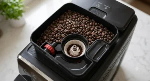 Top view of the coffee bean hopper and ceramic grinder on the Philips 3200 espresso machine