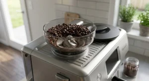 Built-in conical burr grinder and coffee bean hopper on a budget super automatic espresso machine.